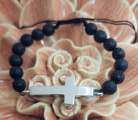 
              Cross Cremation Bracelet with Lava Beads
            