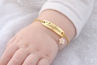 
              Personalized Gold Name Plate Bracelet with Crystal Flower Charm
            