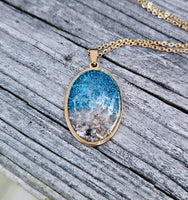 
              Oval Beach Cremation Necklace Made with your loved one's actual ashes
            