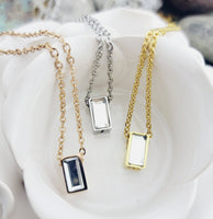 
              Crystal Urn Necklace
            
